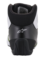 Alpinestars Tech-1 K Start V2 schoenen, kartschoenen, wit zwart en fluogeel, achteraanzicht met ergonomische zwarte hielkap met wit sterlogo, gevoerde kraag en duurzame rubberen buitenzool voor motorsportprestaties