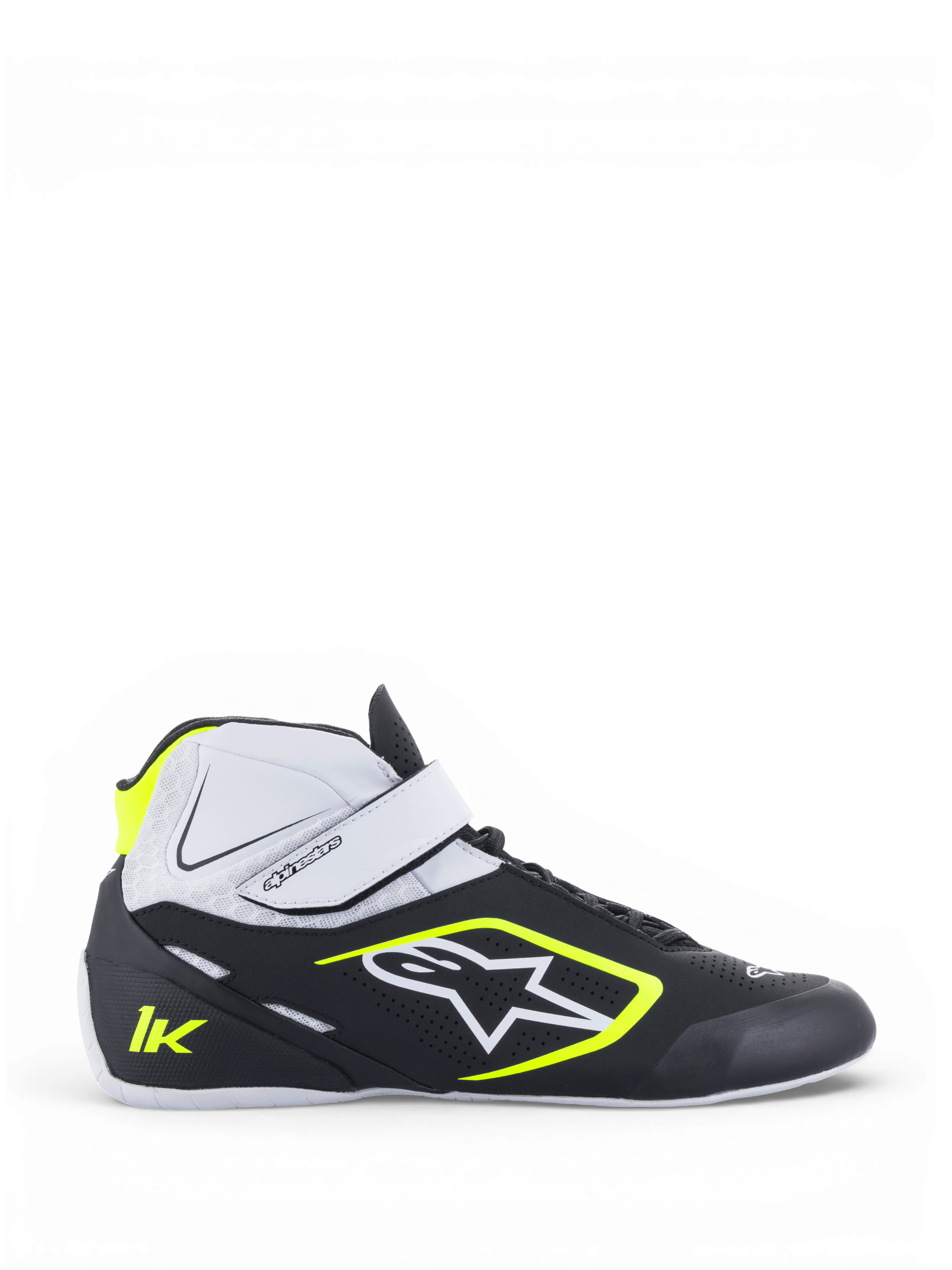 Alpinestars chaussures Tech-1 K V2, chaussures de karting pour homme, noires, blanches et jaune fluo, construction en microfibre légère, double système de fermeture avec sangle auto-agrippante, semelle en caoutchouc spécification Formule 1, vue de profil