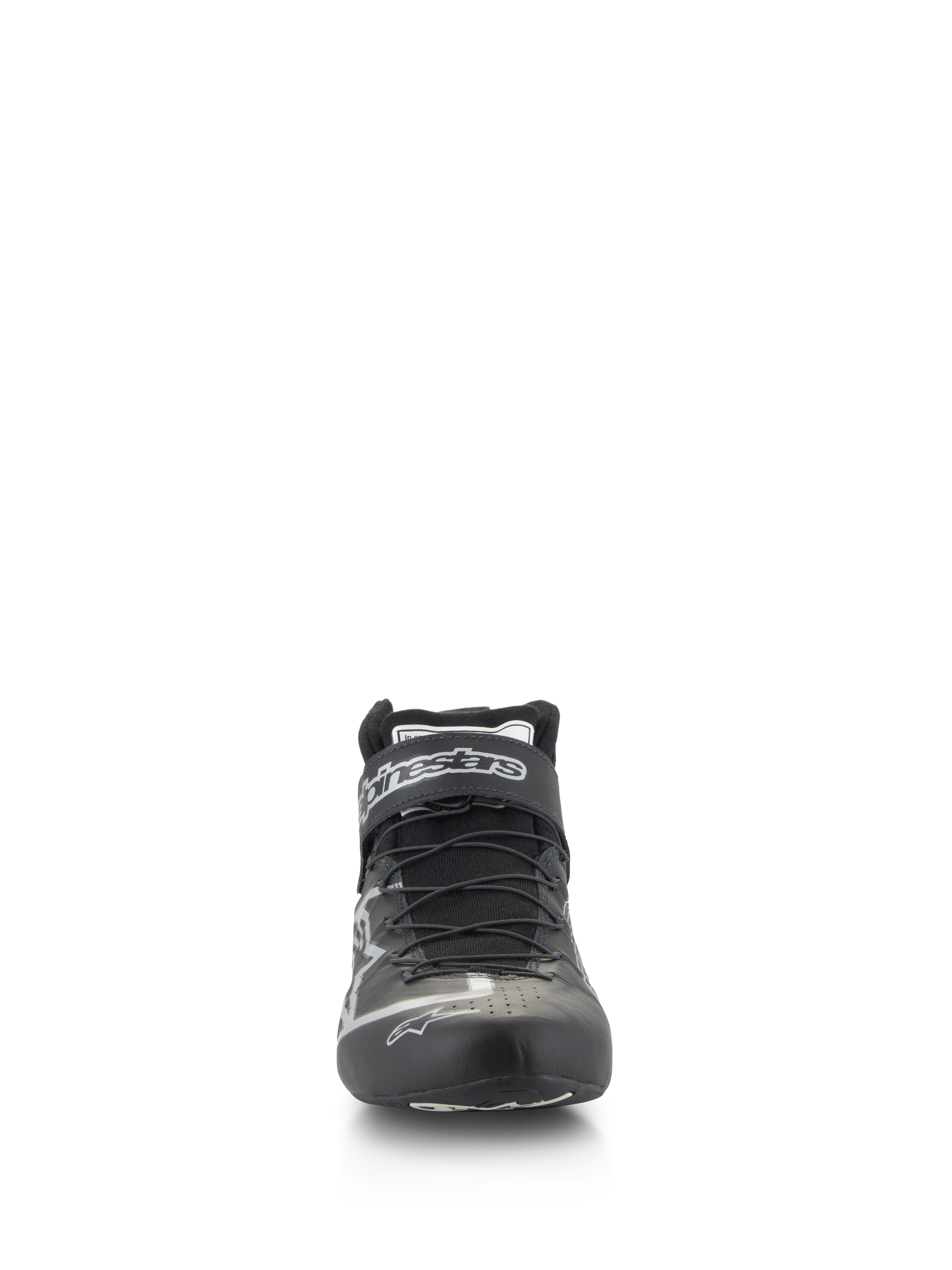 Chaussures Alpinestars Tech-1 Z V3 FIA, chaussures de course automobile, noir et argent, vue de face montrant le système de laçage rapide et le logo Alpinestars sur la sangle, construction élégante en cuir de bovin pour des performances professionnelles en sport automobile
