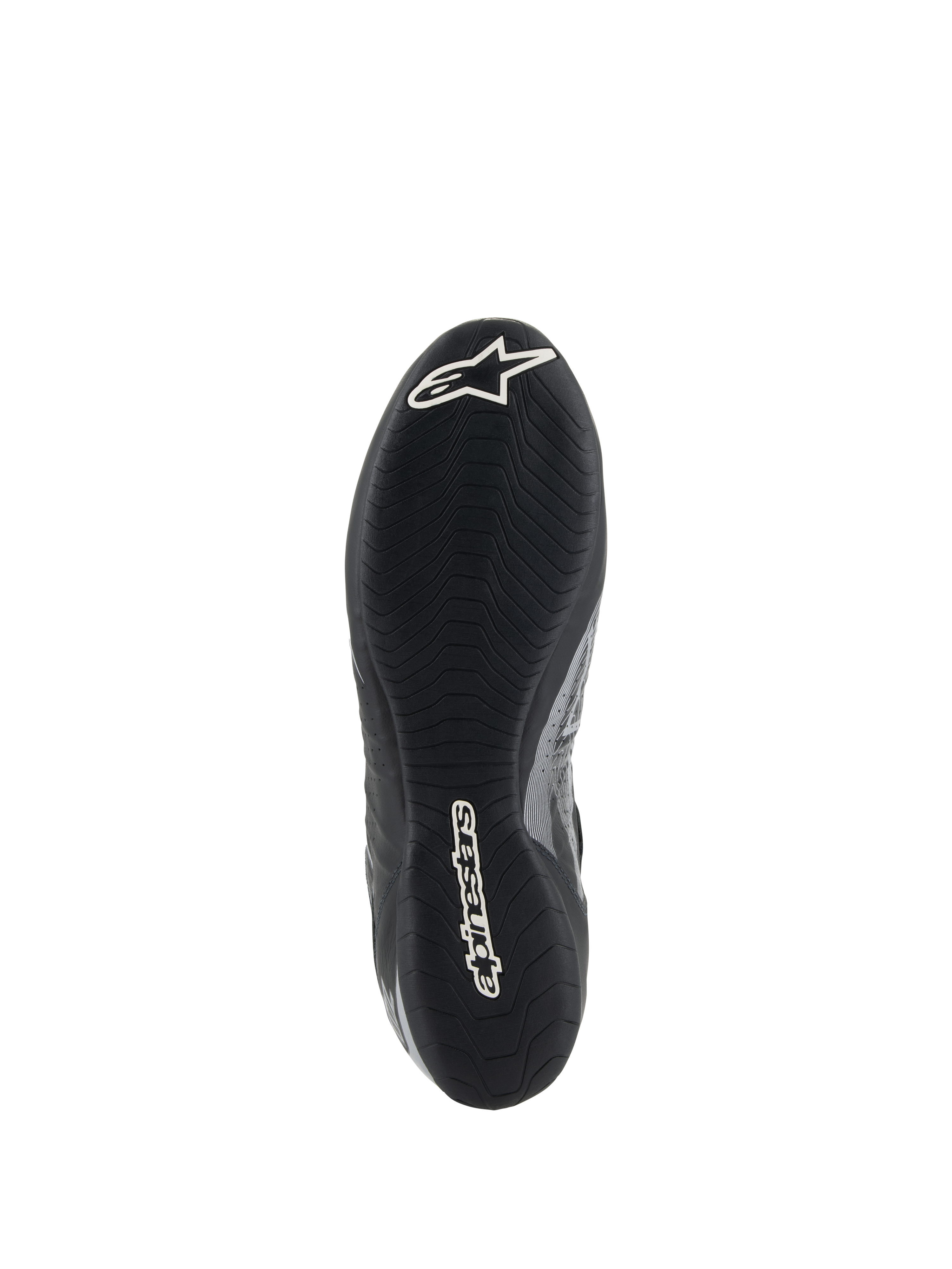 Chaussures Alpinestars Tech-1 Z V3 FIA, vue de la semelle de la chaussure de course Noir Argent, dotées d'une semelle extérieure fine en caoutchouc dérivée de la F1 avec bande de roulement asymétrique, marquage blanc comprenant le logo Astar et le lettrage Alpinestars
