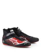 Alpinestars Tech-1 Z V3 Shoes FIA, chaussures de course automobile, noir avec accents rouges et blancs, arborant un grand logo étoile blanc sur le côté, des semelles rouges fines et un système de laçage par fils de précision avec sangle à la cheville.