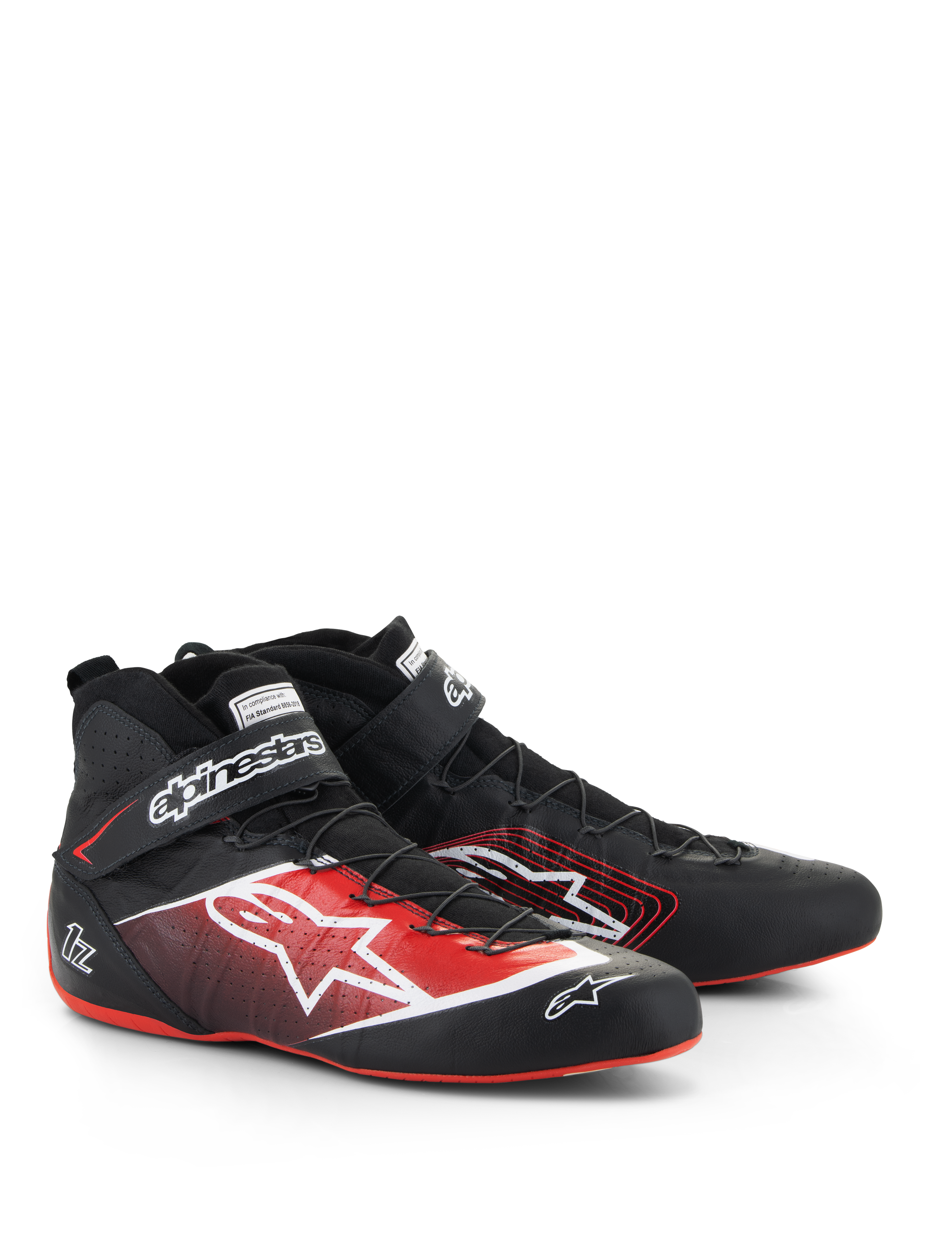 Alpinestars Tech-1 Z V3 Shoes FIA, chaussures de course automobile, noir avec accents rouges et blancs, arborant un grand logo étoile blanc sur le côté, des semelles rouges fines et un système de laçage par fils de précision avec sangle à la cheville.