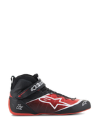 Alpinestars Tech-1 Z V3 Shoes FIA, chaussures de course automobile, noires et rouges, design montant avec logo étoile blanche, finition brillante avec perforations texturées, semelle rouge courbée, certifiées FIA, sangle de cheville avec logo, chaussures de sport automobile aérodynamiques