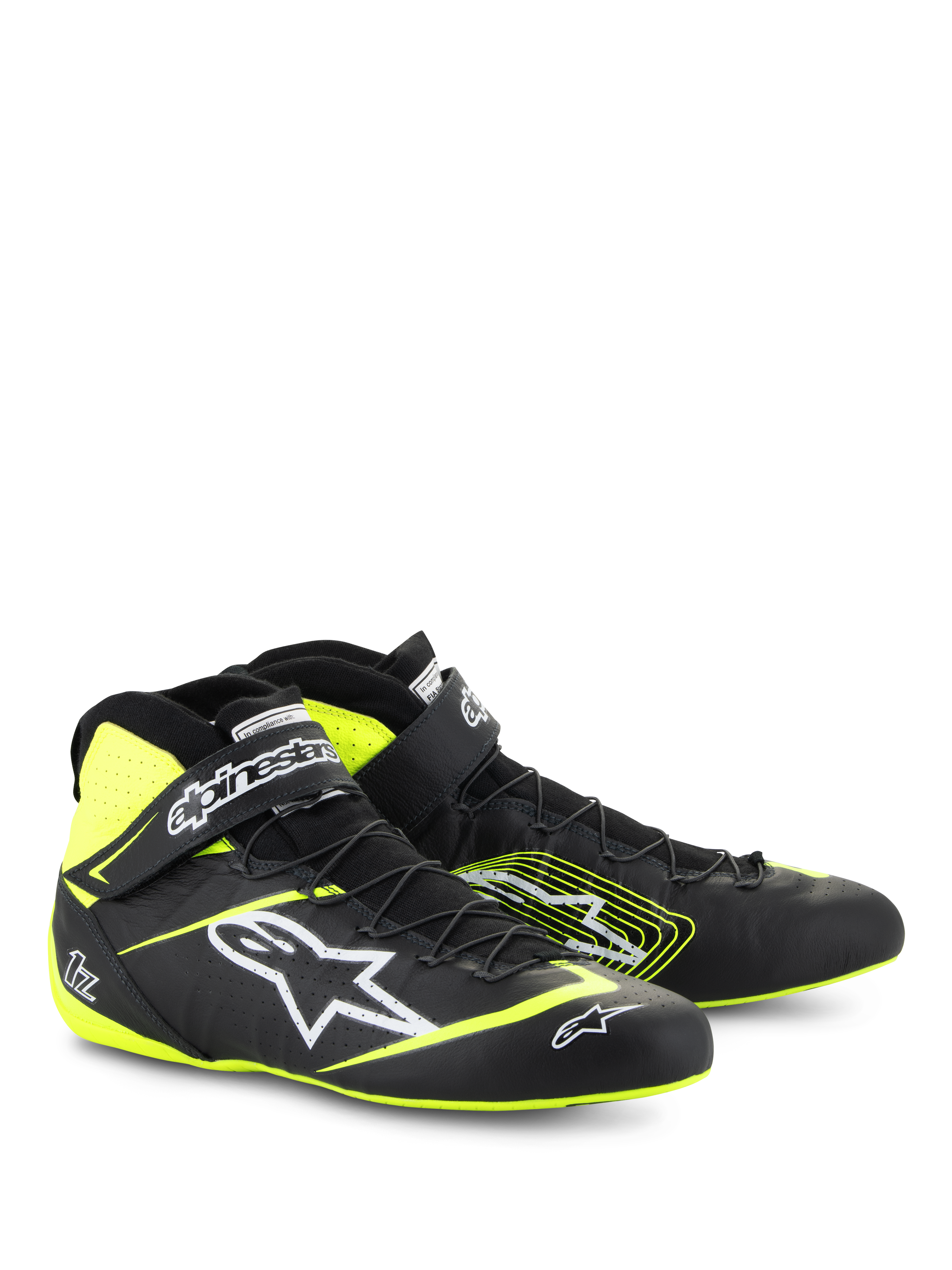 Chaussures Alpinestars Tech-1 Z V3 FIA, chaussures de course automobile, noir et jaune fluo, avec logo Alpinestars blanc, système de laçage rapide et sangle de cheville, design montant en cuir pour le sport automobile professionnel