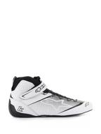 Alpinestars Tech-1 Z V3 Shoes FIA, chaussures de course automobile, blanc et noir, modèle montant avec tige en cuir perforé, fermeture par sangle avec marquage Alpinestars, semelle fine en caoutchouc pour la sensibilité aux pédales, profil sport automobile épuré