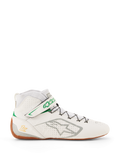 Chaussures Alpinestars Tech-1 Z V3 FIA, chaussures de karting et de course automobile, blanches avec accents verts et gomme, vue latérale avec logo Alpinestars argenté, tige en cuir perforé, silhouette montante avec laçage rapide, design professionnel pour le sport automobile