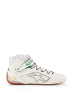 Chaussures Alpinestars Tech-1 Z V3 FIA, chaussures de karting et de course automobile, blanches avec accents verts et gomme, vue latérale avec logo Alpinestars argenté, tige en cuir perforé, silhouette montante avec laçage rapide, design professionnel pour le sport automobile