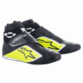 Alpinestars Supermono V2 Shoes FIA, chaussures de course automobile, noir, jaune fluo et blanc, design montant avec manchette côtelée, construction en cuir d'une seule pièce perforée avec logos étoile, profil aérodynamique élégant pour le sport automobile professionnel
