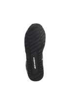 Chaussures Alpinestars Radar, noir et blanc, vue de dessous montrant la semelle exclusive en composé de caoutchouc avec motif de bande de roulement texturé pour l'adhérence et la stabilité, avec le logo Alpinestars au centre.