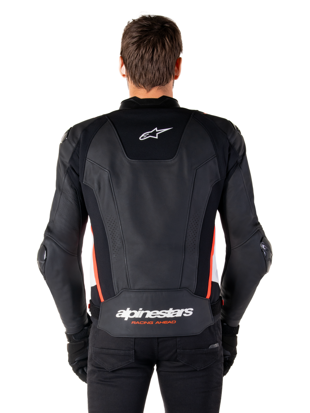 Alpinestars Missile V3 Leren Jas, achteraanzicht, premium zwart leer met rood fluo en witte accenten, met een wit ster-logo op de bovenrug en Alpinestars-branding op de onderrug, gedragen met een zwarte broek en handschoenen.
