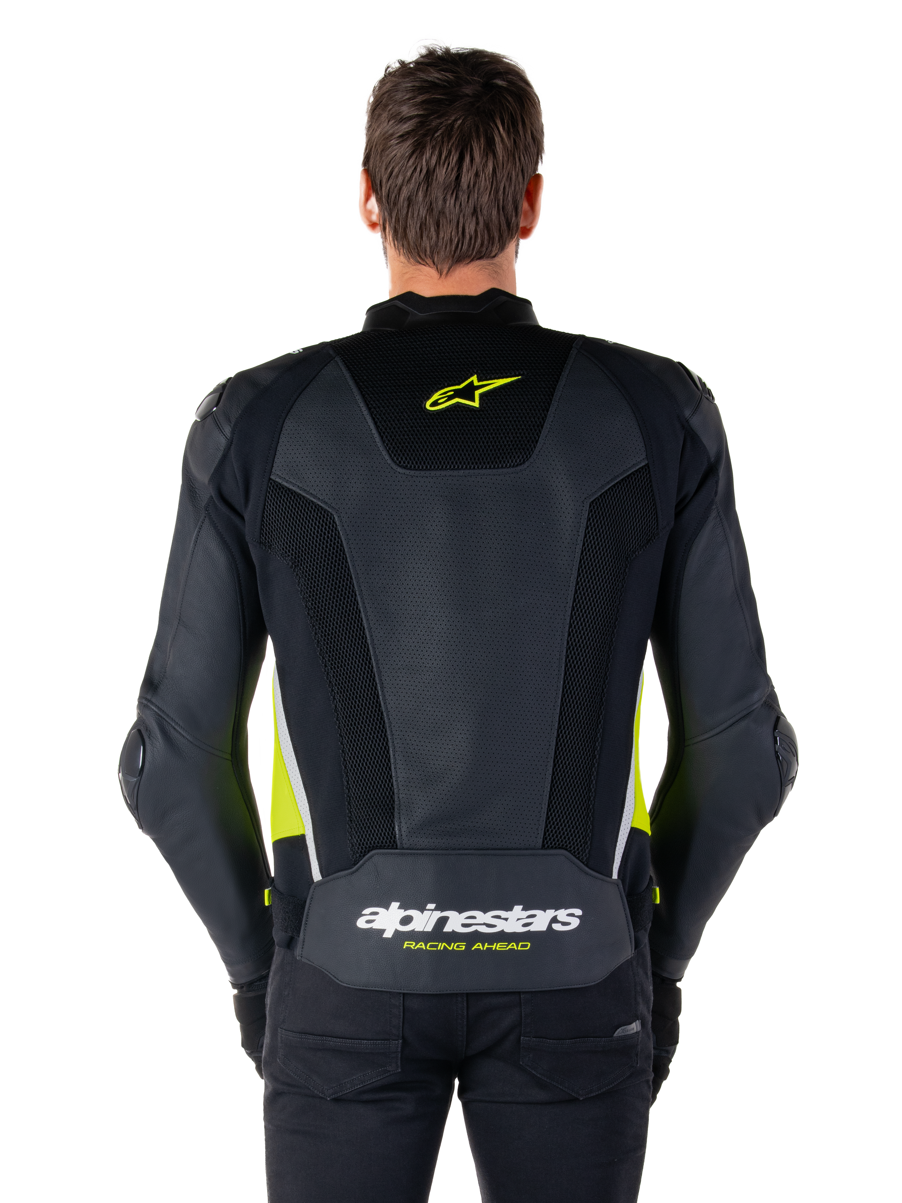 Alpinestars Missile V3 Airflow Lederjacke, Rückansicht, Schwarz mit gelb-fluo und weißen Akzenten, großflächige perforierte Lederbahnen zur Kühlung, Alpinestars-Logo auf dem oberen und unteren Rücken, rennsportinspirierte Motorrad-Sportjacke