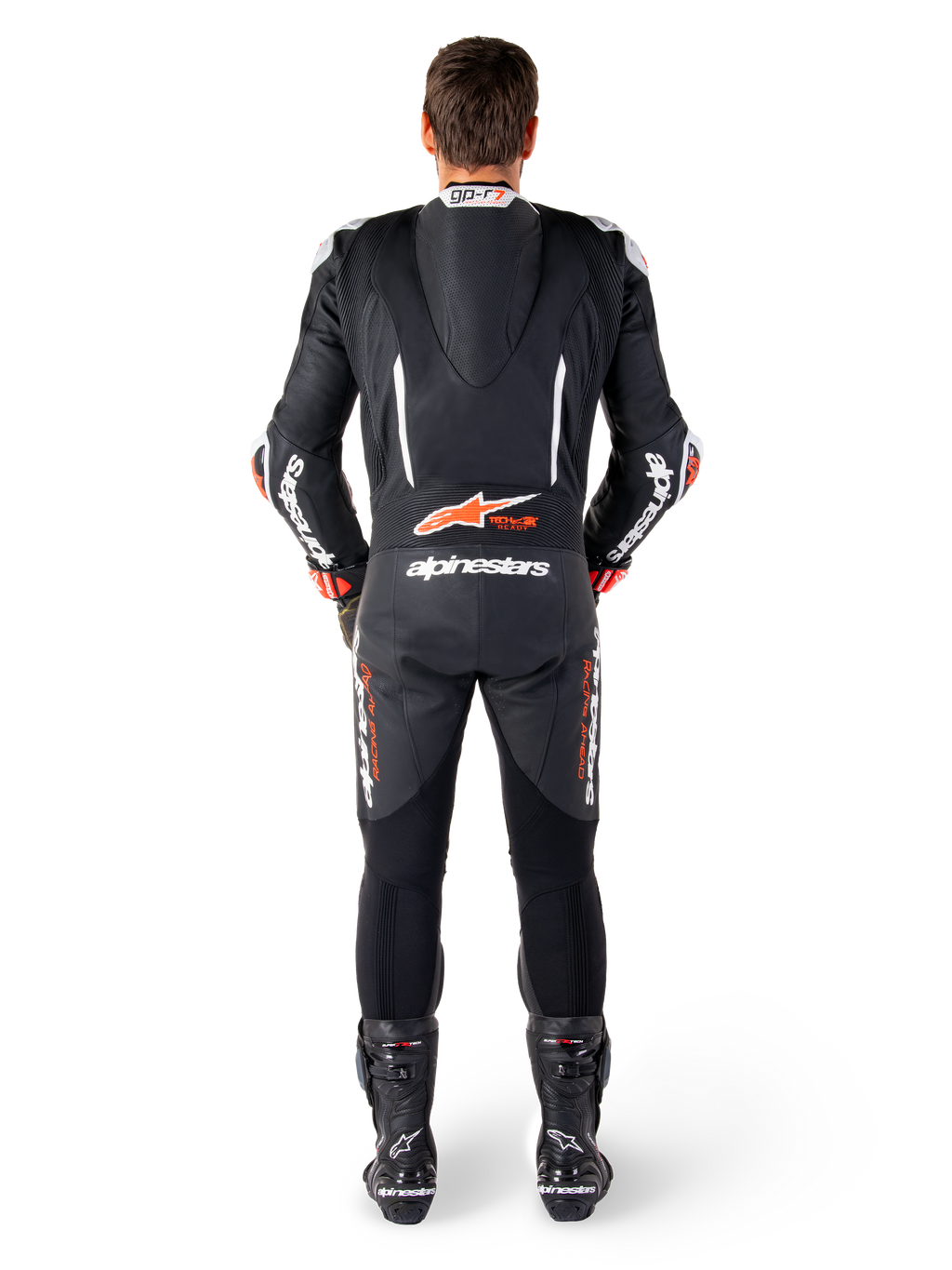 Alpinestars GP-R7, combinaison cuir noire et blanche, rouge fluo, bosse aérodynamique et panneaux en accordéon, vue de dos