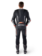 Alpinestars GP-R7, combinaison cuir noire et blanche, rouge fluo, bosse aérodynamique et panneaux en accordéon, vue de dos
