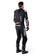 Alpinestars GP-R7, combinaison en cuir 1 pièce homme, noire et rouge fluo, avec bosse aérodynamique et Tech-Air Ready.