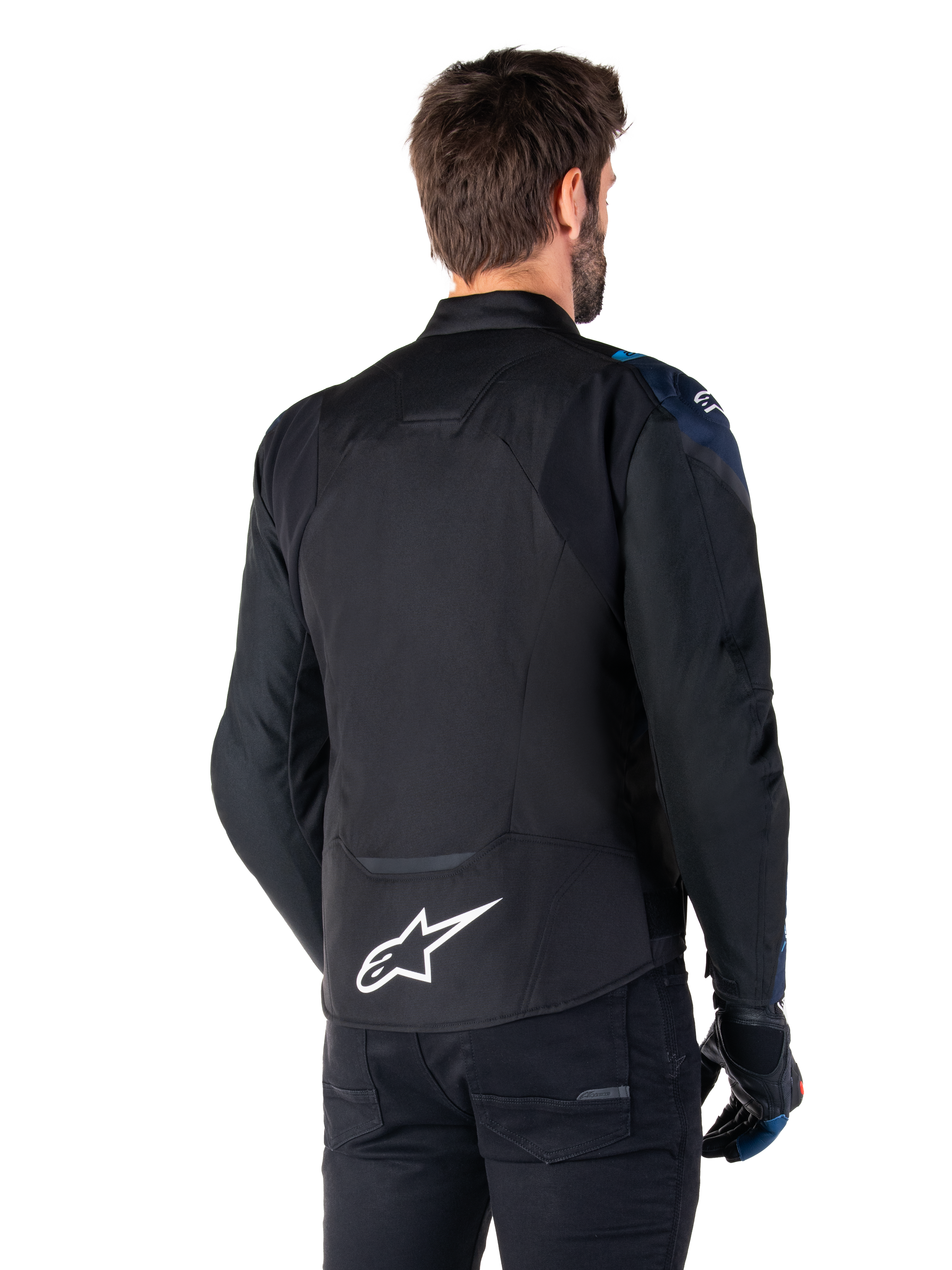 Alpinestars T-Jaws V4 Waterproof Jacket, Back View, Black with Dark Blue and Blithe Blue details, white star logo on lower back, sport silhouette, worn with black pants and riding gloves