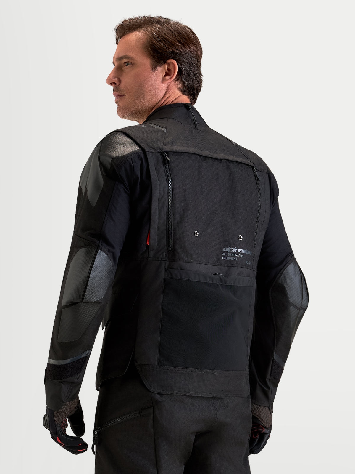 Alpinestars Harok V 2 Drystar jas, heren all-terrain avontuurlijke motorjas, achteraanzicht met modulaire ventilatiepanelen en beschermende pantserconstructie, zwart