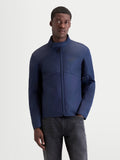 Alpinestars C-1 Waterproof Jacket, men's urban contemporary motorcycle textile jacket in dark blue, front view worn by a model showing waterproof construction and soft-finish collar