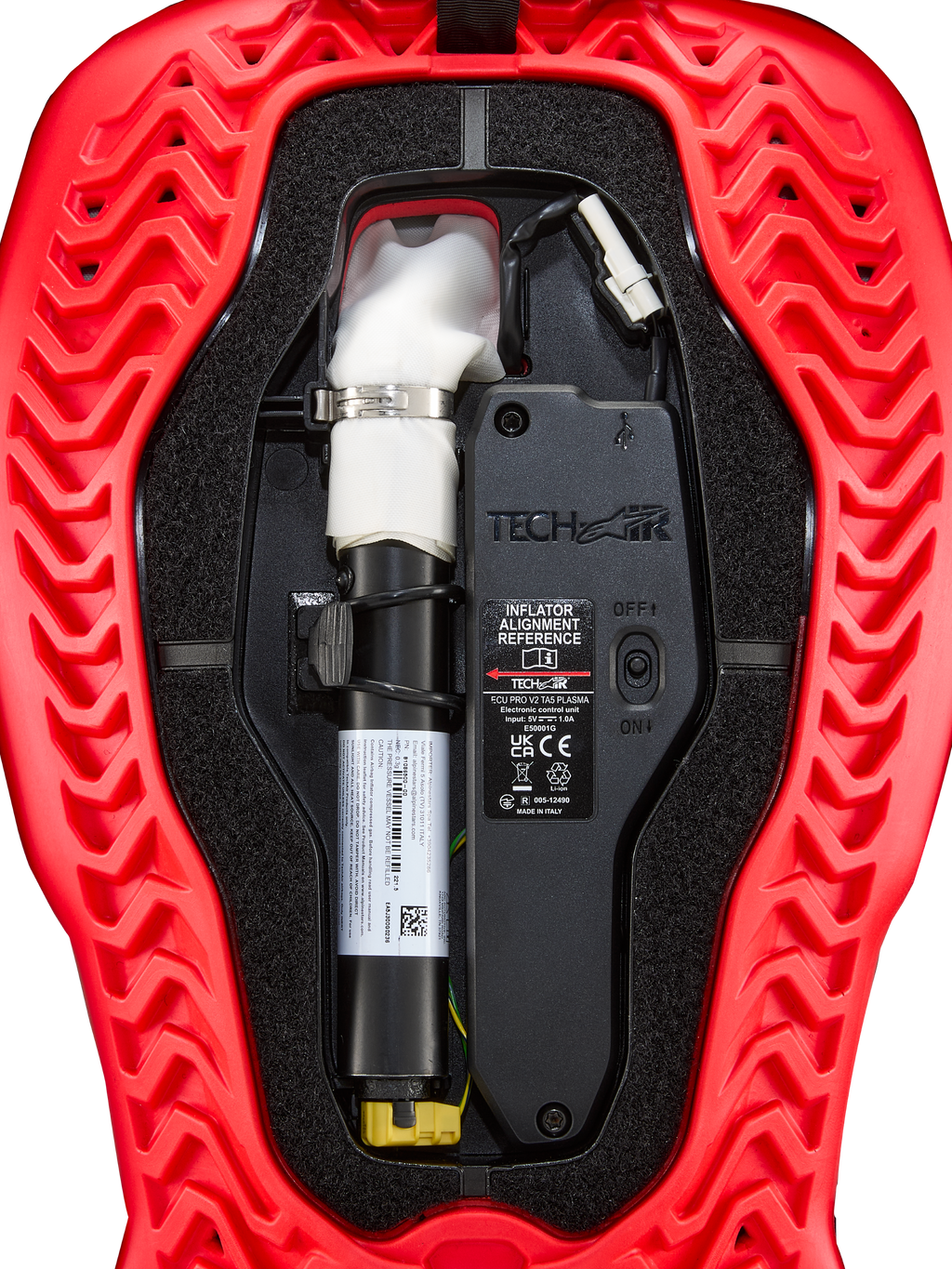 Alpinestars Tech-Air® 5 Plasma Airbag-Ersatzkartusche mit schwarzer ECU und weißem Inflator in roter Schale, Rot und Schwarz.