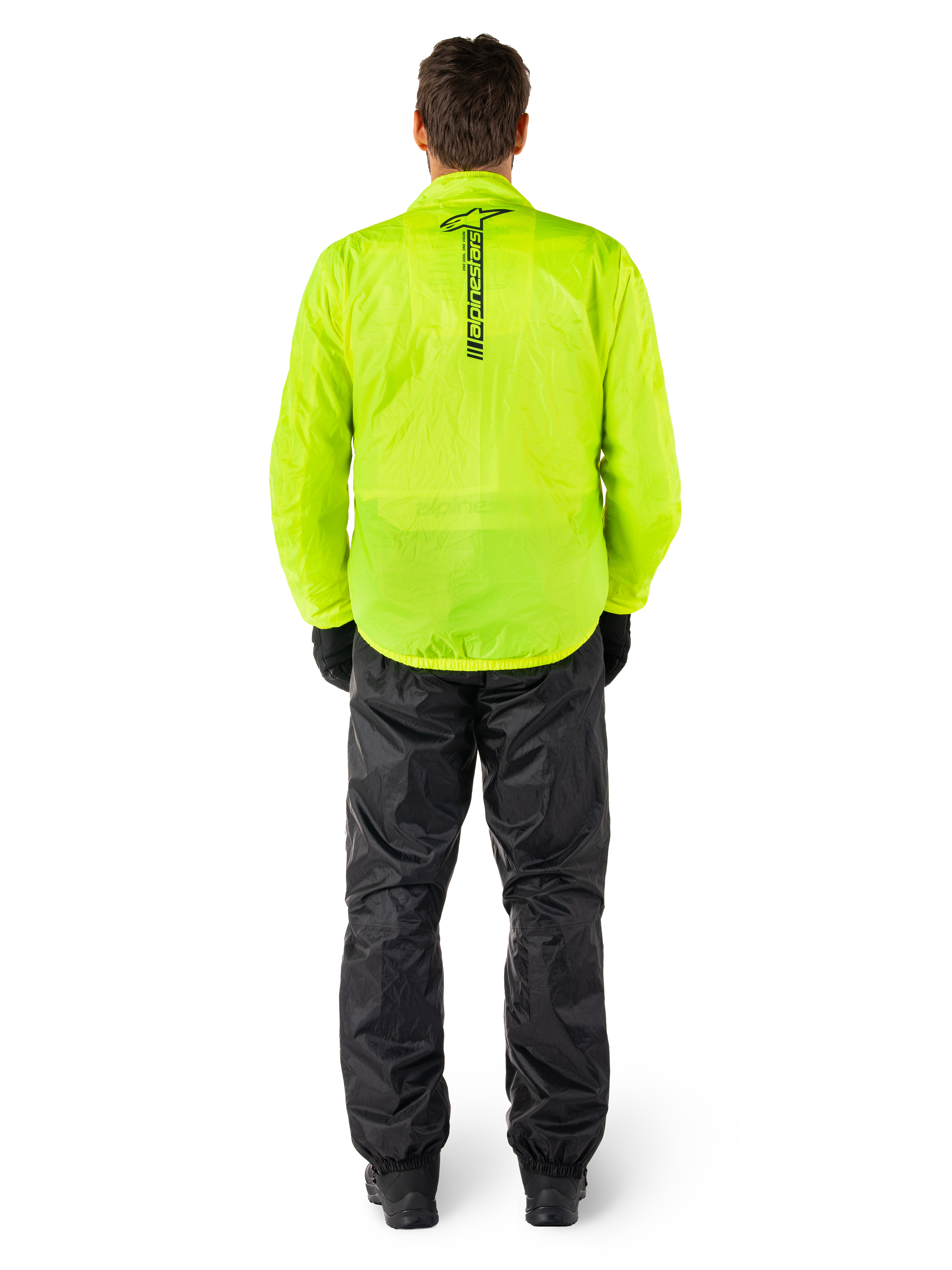 Veste et pantalon Alpinestars Hurricane Rain V2, combinaison de pluie imperméable pour moto, veste jaune fluo éclatant avec marquage noir vertical au dos, pantalon noir, textile léger conçu pour la protection par temps humide