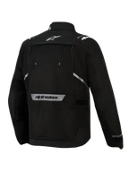 Alpinestars Cusco Drystar® Jacket, Black, Back View, featuring white star logo on the upper back, reflective Alpinestars wordmark on the lower back, large zippered ventilation panel, and durable textile construction for adventure touring