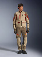Maxdura Drystar®XF Laminated Armored Shell, adventure motorcycle jacket in Aluminum Walnut Rust Brown, worn by a male model with matching adventure pants, gloves, and boots, full-body studio shot of professional touring gear.