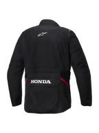 Alpinestars Honda ST-1 Waterproof Jas, achteraanzicht, zwart textiel, met wit Alpinestars-sterlogo op de bovenrug en Honda-branding op de achterste cargozak, rode accenten aan de zijkanten, duurzame touring motorjas