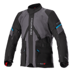 Alpinestars Monteira Drystar XF jas, adventure touring motorjas, grijs en zwart met Methyl Blue accenten, voorzien van meerdere voorzakken, verstelbare tailleriemen en verticale Alpinestars-branding op de borst, duurzame waterdichte textielconstructie