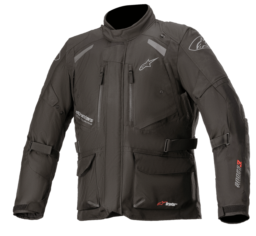 Alpinestars Andes V3 Drystar, veste de moto touring aventure, noire avec logos blancs et rouges, multiples poches cargo imperméables, sangles réglables pour un ajustement personnalisé, construction textile résistante aux intempéries, panneaux réfléchissants pour la visibilité