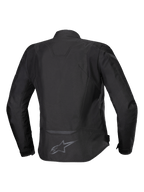 Alpinestars Stella T-Jaws V4 Wasserdichte Jacke, Damen-Textilmotorradjacke, Schwarz auf Schwarz, Rückansicht mit ergonomischer sportlicher Silhouette, reflektierenden Details und Logo am unteren Rücken.