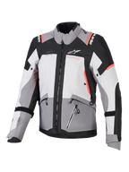 Alpinestars Stella Andes V4 Drystar, veste de moto touring pour femme, grise et noire avec accents corail fluo, textile imperméable.