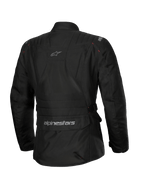 Veste imperméable Alpinestars Stella ST-1, veste de moto pour femme, noire, vue arrière présentant une grande poche cargo au bas du dos avec logo, design adventure touring avec marquage discret en haut du dos, construction textile imperméable durable