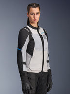Alpinestars Stella ST-2 Air Jacket, Women's Motorcycle Jacket, Ice Gray and Black, Large mesh ventilation panels and laser-cut perforations, "Alpinestars Exploration Equipment" branding on chest, Technical summer riding gear