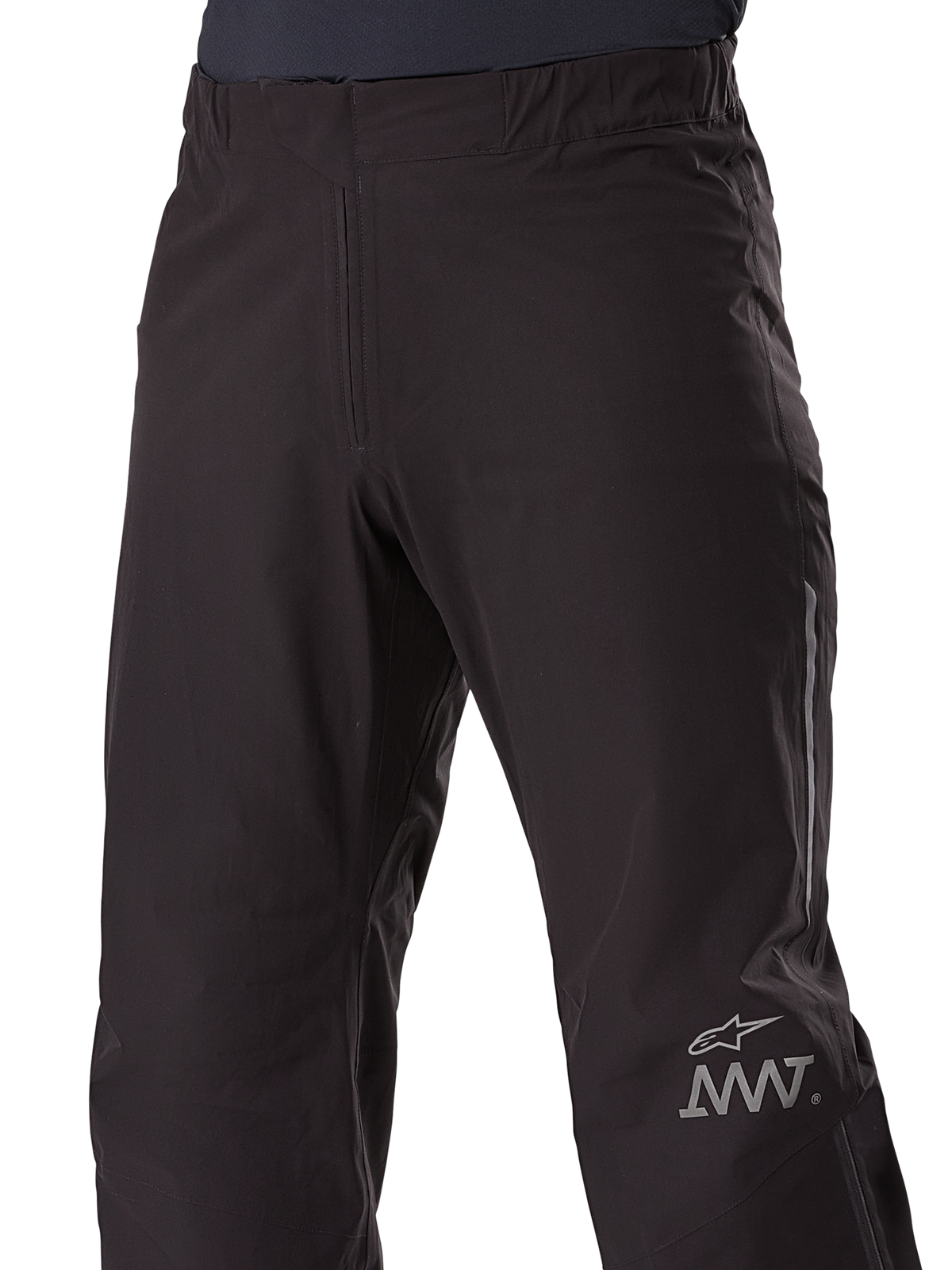 Alpinestars AMT-8 Stretch Drystar® XF Pant Liner, doublure de pantalon de moto, noir, avec l'étoile Alpinestars et le logo AMT sur la jambe, taille élastique, construction textile imperméable épurée