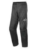 Alpinestars Hurricane Rain V2 Pant, pantalon de pluie imperméable pour moto, noir, avec logo réfléchissant sur la cuisse gauche, taille élastiquée, genoux ergonomiques et tissu laminé brillant résistant au vent pour le touring routier et d'aventure