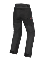 Alpinestars Andes V4 Drystar® Pants - Court, pantalon de moto, noir, vue arrière avec panneaux renforcés à l'assise et aux jambes, logo Drystar rouge sur la hanche, sangles réglables à la taille et aux chevilles, construction textile durable pour le touring d'aventure