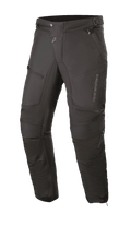 Pantalon Alpinestars Raider V2 Drystar®, pantalon de moto touring noir, construction en textile imperméable avec panneaux en accordéon aux genoux, poches zippées et taille ajustable, conception durable pour la route par tous les temps