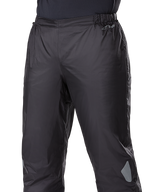 Pantalon Alpinestars Bogotá Pro Drystar® 3 Seasons, doublure imperméable Drystar®, noir, construction en textile léger avec taille élastique, avec logo Drystar et détails réfléchissants pour le touring d'aventure.