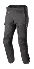 Alpinestars Bogota Pro Drystar 4 Seasons Pants Short, pantalon de moto touring noir, imperméable et respirant, panneaux de genoux en accordéon renforcés, sangles de taille réglables, ventilations et poches zippées, tissu Ripstop durable, protection toutes saisons