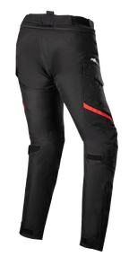 Pantalon Alpinestars Stella Honda Andes V3 Drystar® pour femme, pantalon de touring moto, noir et rouge vif, vue de dos avec poches cargo, sangles de réglage à la taille et aux genoux, construction en textile robuste pour toutes saisons
