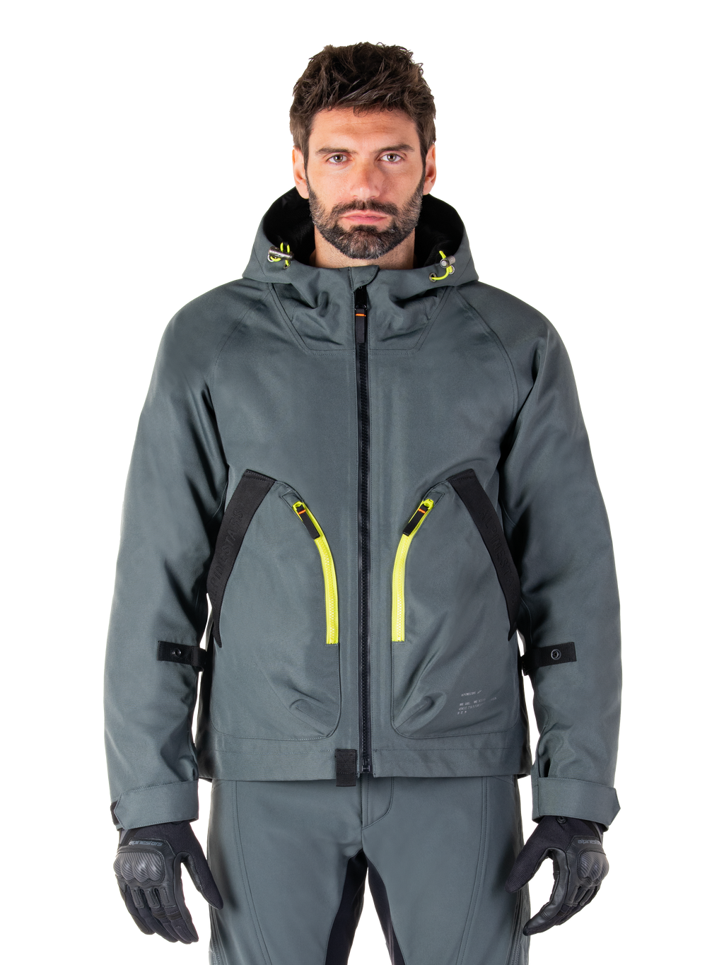Alpinestars Morush Waterproof Parka, veste de moto gris urbain, fermetures éclair jaune vif et accents noirs, modèle à capuche avec de grandes poches avant, style technique inspiré du streetwear