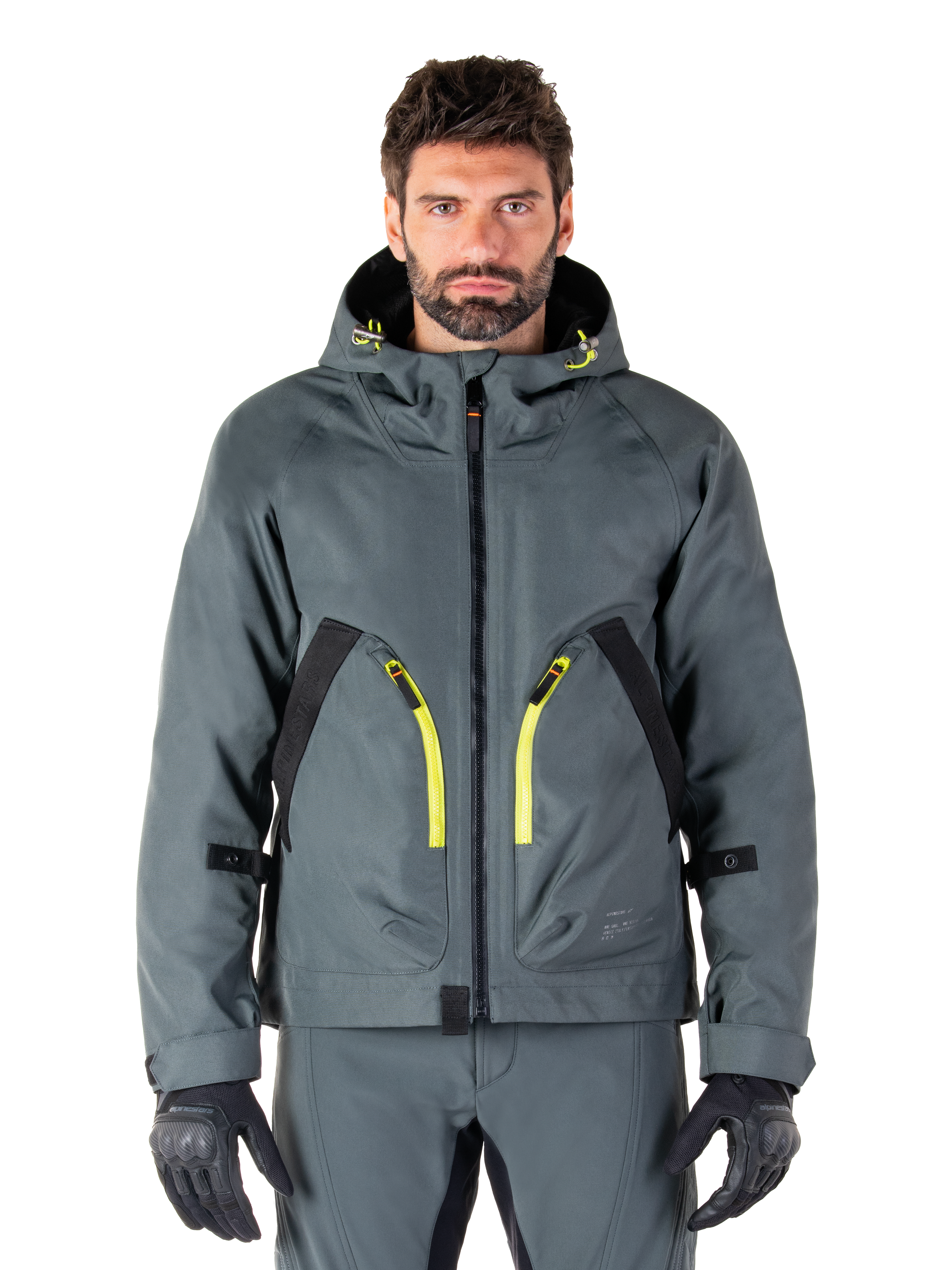 Alpinestars Morush Waterproof Parka, urban-graue Motorradjacke, leuchtend gelbe Reißverschlüsse und schwarze Akzente, Kapuzendesign mit großen Vordertaschen, technisches, von Streetwear inspiriertes Styling