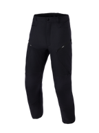 Alpinestars Explore AST Hose Kurz, Motorrad-Adventure-Hose, Schwarz, Vorderansicht, technische Stretch-Ripstop-Konstruktion, diagonale Cargo-Reißverschlusstaschen, ergonomisches Design für Fahrten bei warmem Wetter