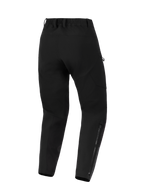 Alpinestars Stella Flex-AST Explorer Pants, pantalon de moto pour femme, noir, vue arrière présentant une construction en textile extensible, une taille élastique avec passants de ceinture et de longues fermetures éclair sur le bas des jambes pour le pilotage d'aventure.