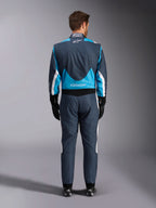 Combinaison Alpinestars GP Pro Comp V2 FIA, grise, bleue et blanche, vue arrière, protection de course automobile.