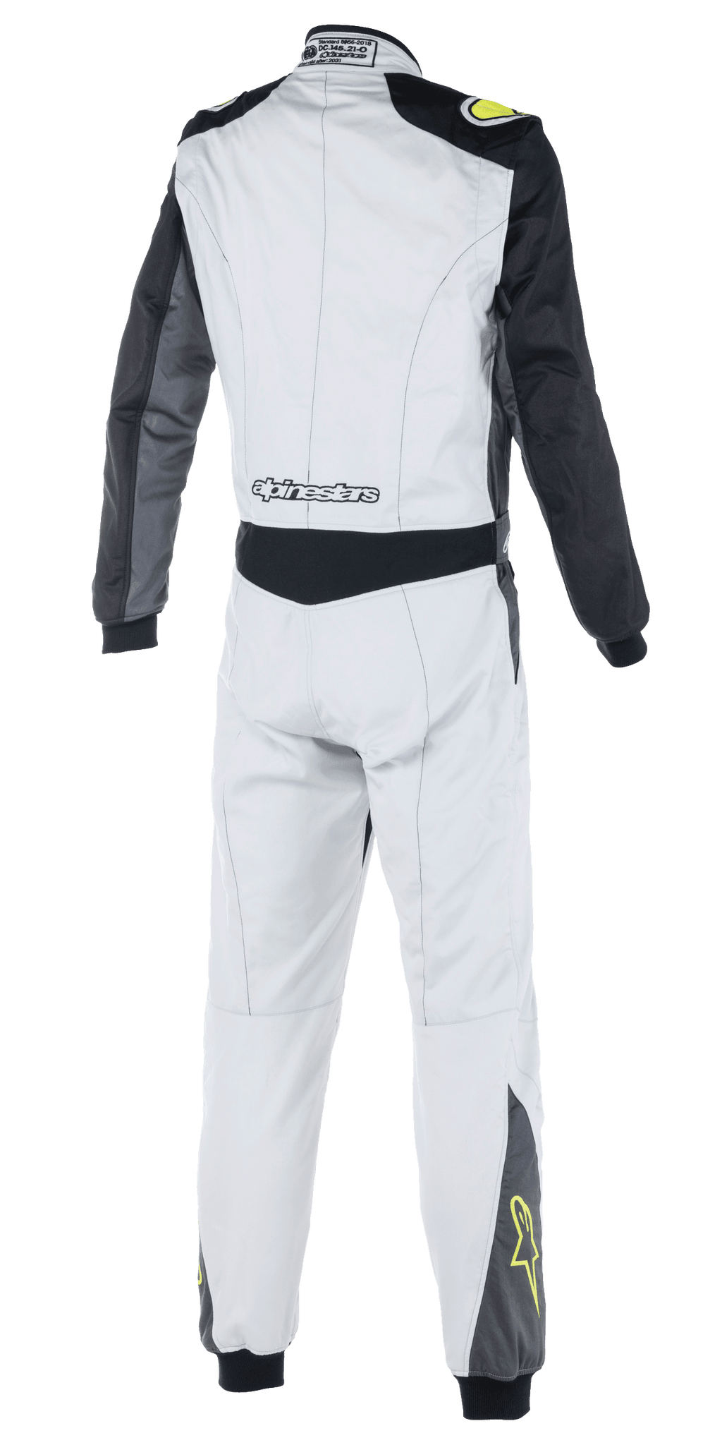 Alpinestars Atom FIA-pak, autoracepak, zilver, antraciet en geel fluo, achteraanzicht met zwarte mouwen en taillepaneel, Alpinestars-branding op de onderrug, gele ster-logo's op de onderbenen, FIA-gecertificeerde motorsportkleding