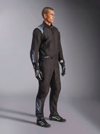 Alpinestars KMX-5 V3 Suit, Karting Suit in Black Dark Shadow, worn with matching black racing gloves and shoes, featuring laser-cut perforations and tech mesh panels, sleek dual-layer design with white branding for professional motorsport