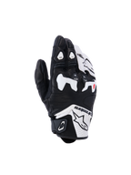 Gants Alpinestars SP-R Tech, gants de moto de course, noirs et blancs, dotés d'une protection d'articulations divisée en TPU blanc, construction en cuir perforé, logo Alpinestars sur la manchette et accents rouges sur les doigts, design sport à manchette courte.