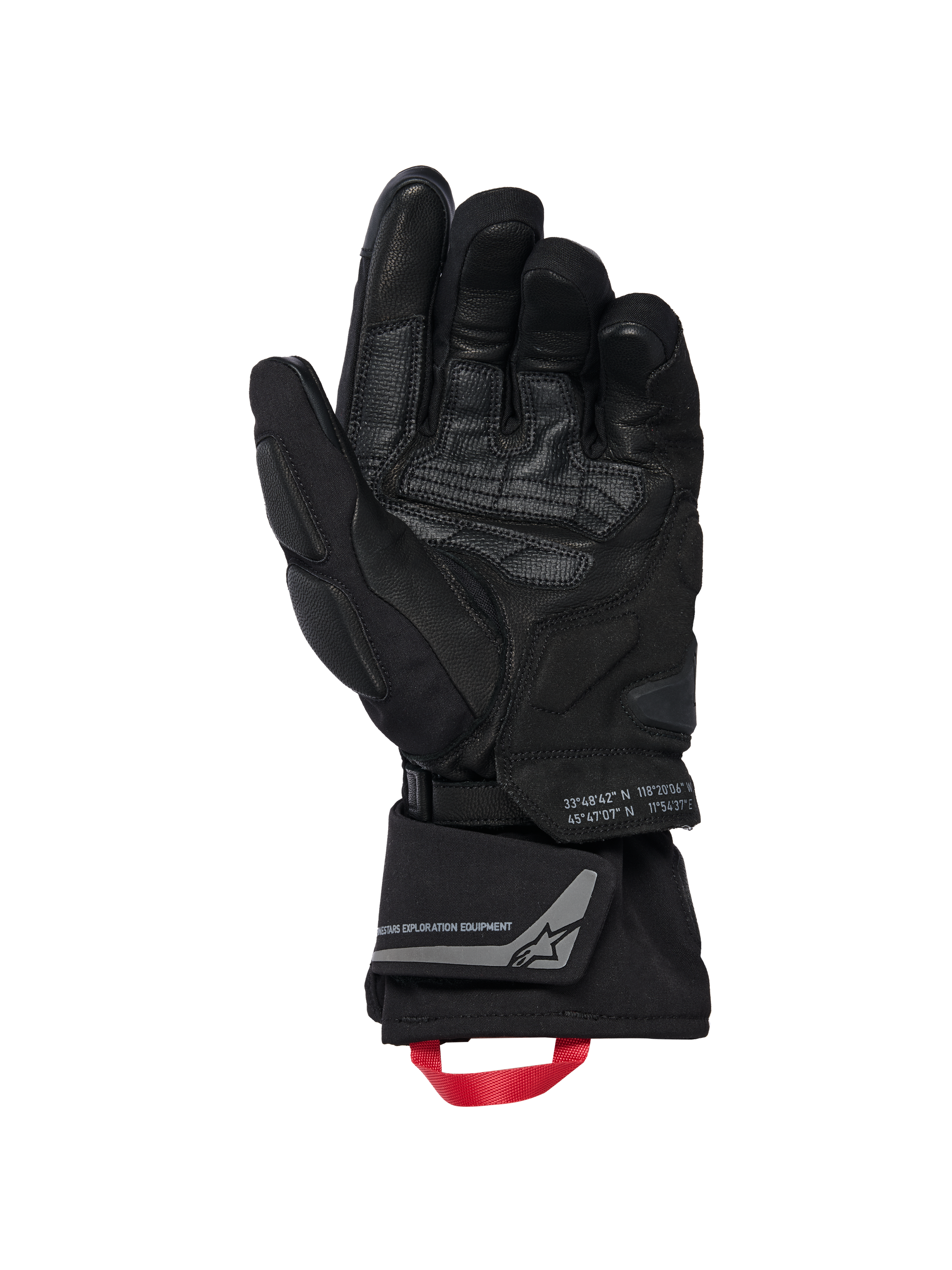 Gants isolés Alpinestars WT-8 GORE-TEX, gants de moto, noirs, vue de la paume intérieure montrant des empiècements en cuir renforcé et des protections rembourrées, manchette longue avec boucle de tirage rouge et marquage Alpinestars Exploration Equipment avec coordonnées géographiques, design technique pour la route et l'aventure
