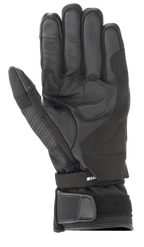 Gants Alpinestars Andes V3 Drystar®, gant de moto noir, vue de la paume avec construction en cuir de chèvre et textile, zone de la paume renforcée, sangle de poignet ajustable avec manchette velcro, design technique de touring toutes saisons