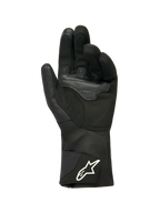 Gants Femme Alpinestars Stella WT-1 Drystar® Thermiques, Noir, vue de la paume en daim doux avec renfort pour l'adhérence, manchette longue en textile avec logo Alpinestars blanc sur la sangle, bouts de doigts compatibles avec les écrans tactiles, équipement moto technique pour l'hiver